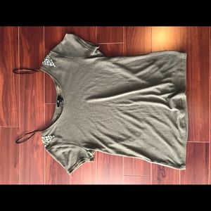 Casual deep green top with studs on shoulder